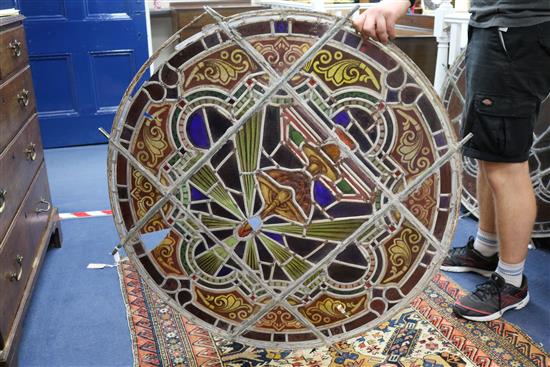 A set of eleven 19th century stained glass roundels, diameter 24in.